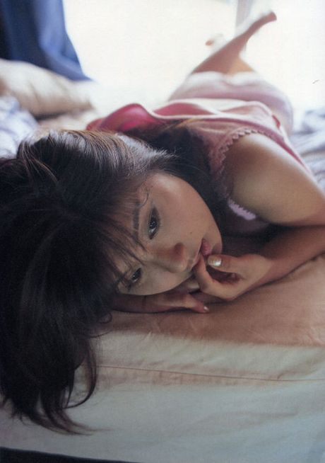 Big, plump boobs spilling out of this gravure idols corset