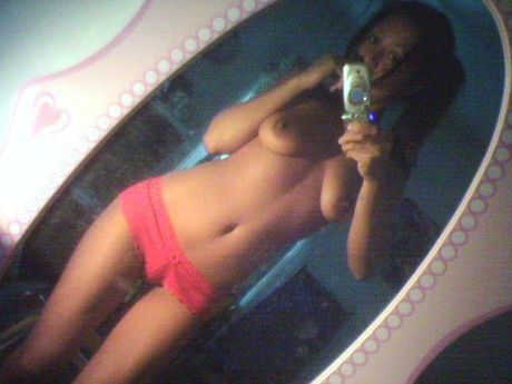 Filipina girlfriend taking self shot pics in front of mirror