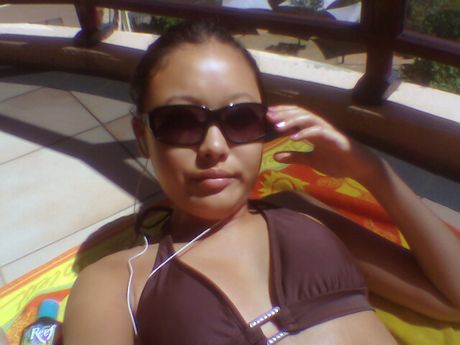 Hot Thai girlfriend looking very stylish with her sun glasses