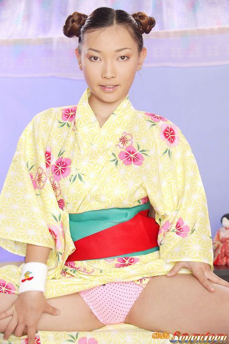 Busty Japanese teen chick spreading her tight young pussy