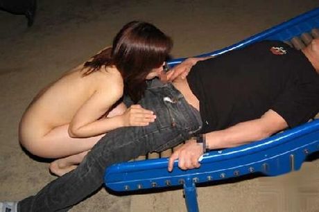 Asian teen amateur girl strips and gives a nice blowjob in public