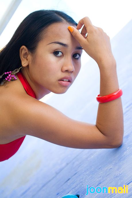 Joon Mali unbuttons Daisy Duke shorts and unties her top