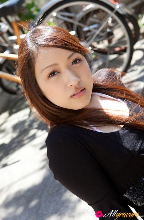 Cocoro Hirahara Asian takes long socks and shorts off for camera