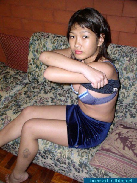 Asian amateur girl with amazing juggs strips and shows her shaved pussy