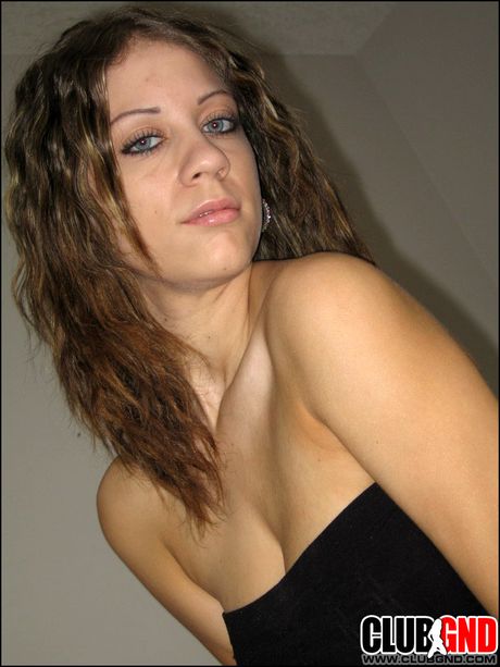 Asian babe Jazmin strips and shows her big racks and ass in a solo